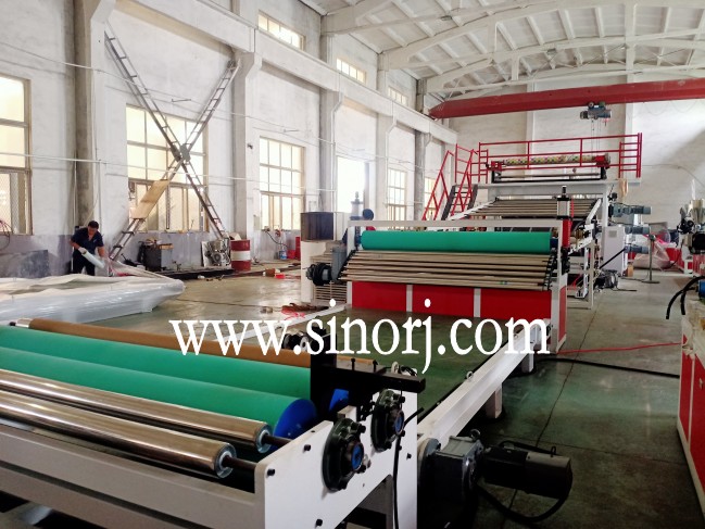 仿大理石板生產(chǎn)線，地板革生產(chǎn)線，三輥四輥集裝箱發(fā)貨中